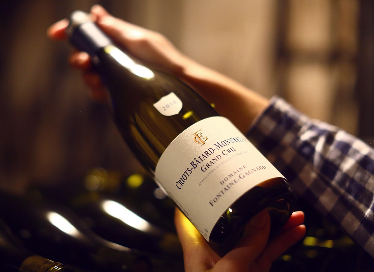 A_bottle_of_the_domaine's_Criots-Batard-Montrachet_in_the_cellar